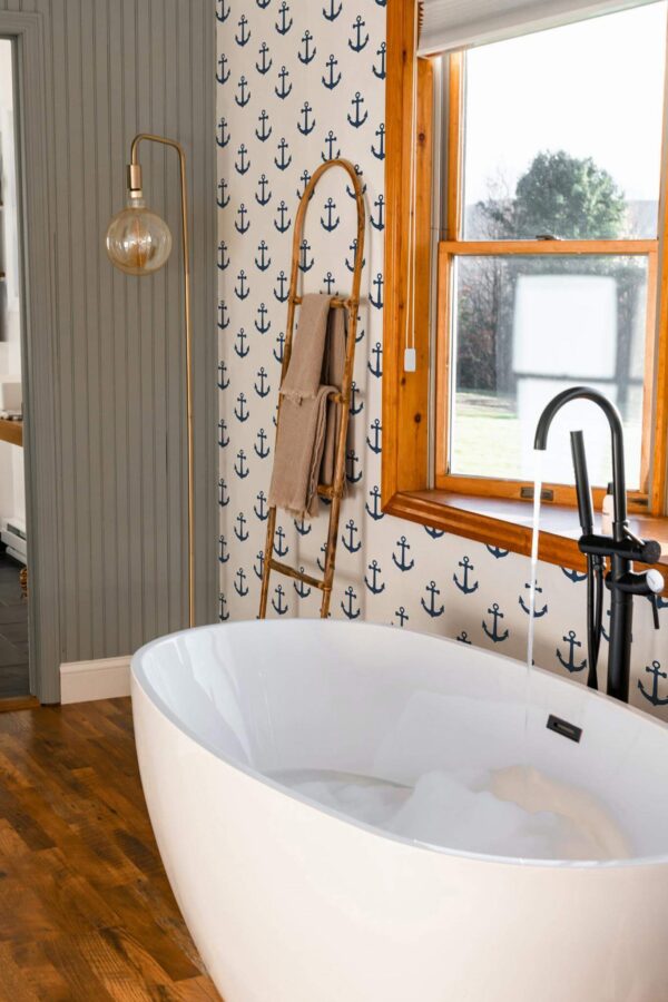 Mid-century modern style bathroom decorated with Nautical peel and stick wallpaper