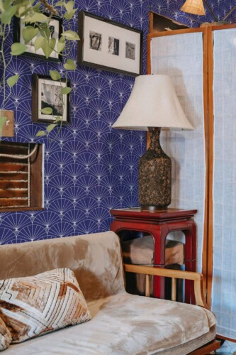 Southwestern style living room decorated with Navy Art Deco peel and stick wallpaper