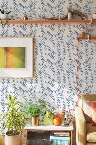 Southwestern style living room decorated with Navy peel and stick wallpaper