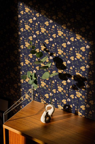 Mid-century style living room decorated with Navy yellow floral peel and stick wallpaper
