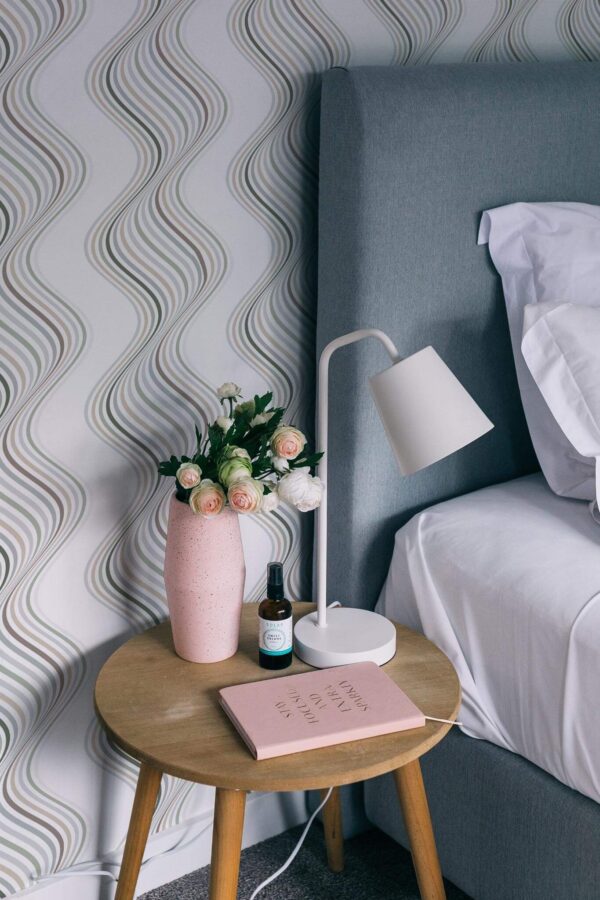 Rustic style bedroom decorated with Neutral waves peel and stick wallpaper