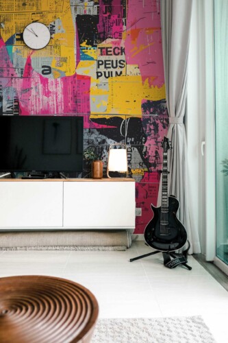 News Graffiti Wall Mural with pink and colorful abstract newspaper graffiti pattern, ideal for accent walls and modern creative spaces.