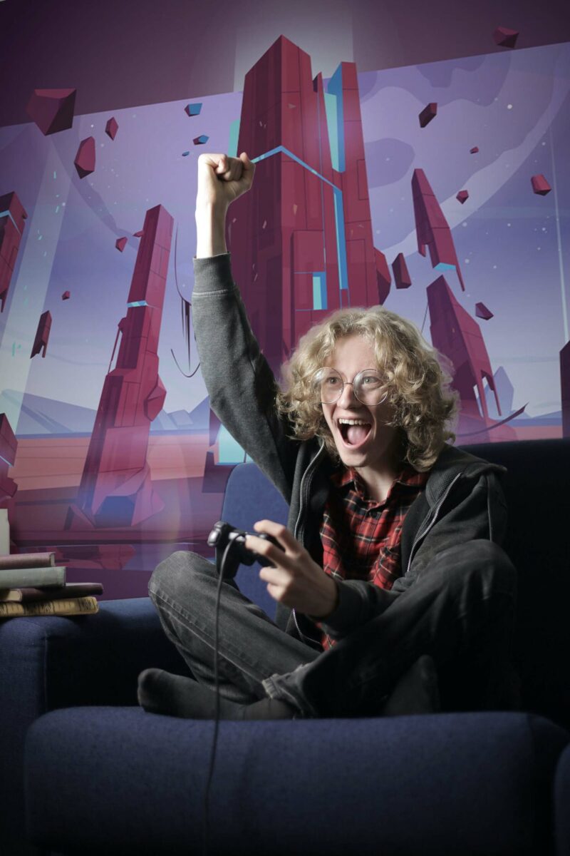 Ultimate Gaming Room peel and stick or non-pasted wall mural. Fancy Walls removable self-adhesive or traditional purple gaming eco-friendly and PVC-free game room mural wallpaper.