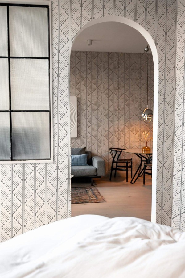 Modern scandinavian style living room decorated with Oak Leaf peel and stick wallpaper