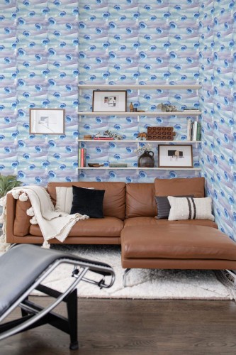 Mid-century modern style living room decorated with Ocean jellyfish peel and stick wallpaper