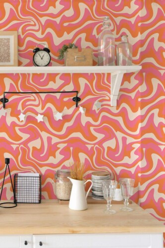 Orange groovy wallpaper pattern featuring funky curves and vibrant hues, perfect for accent walls. In this modern kitchen, the design adds a bold, contemporary twist that energizes the space while maintaining a playful and sophisticated aesthetic.
