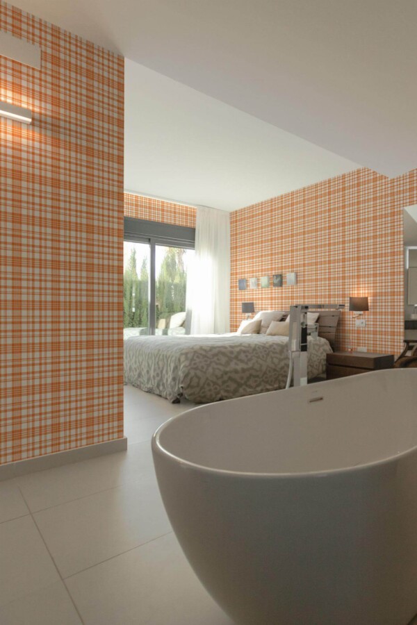 Modern style bedroom with open bathroom decorated with Orange plaid peel and stick wallpaper