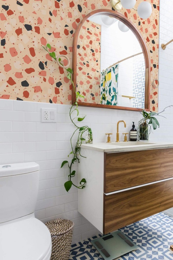 Boho scandinavian style powder room decorated with Orange terrazzo peel and stick wallpaper