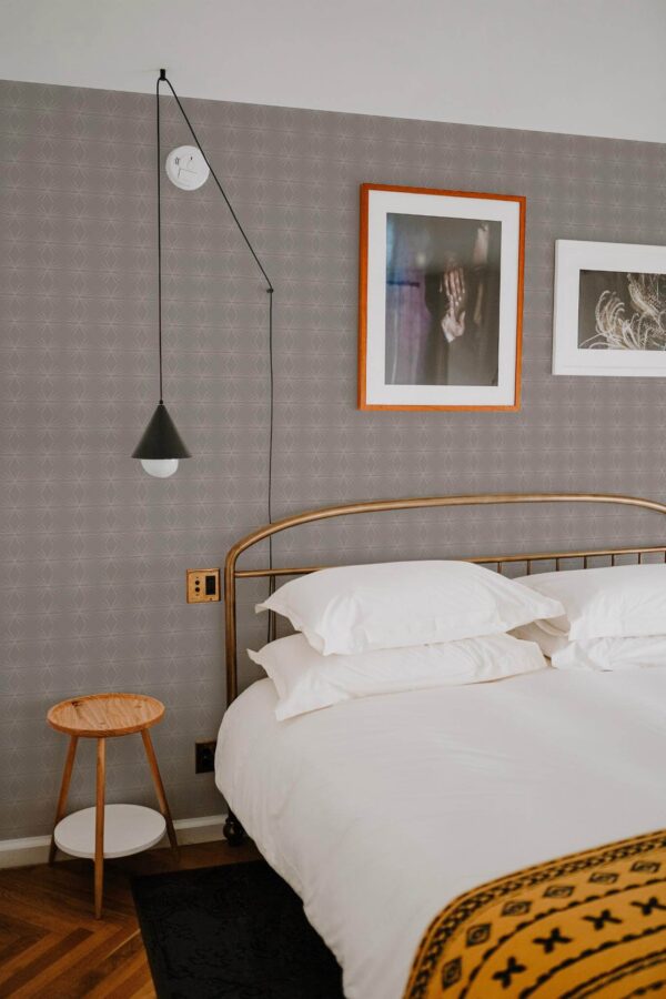 Minimal boho style bedroom decorated with Ornamental peel and stick wallpaper