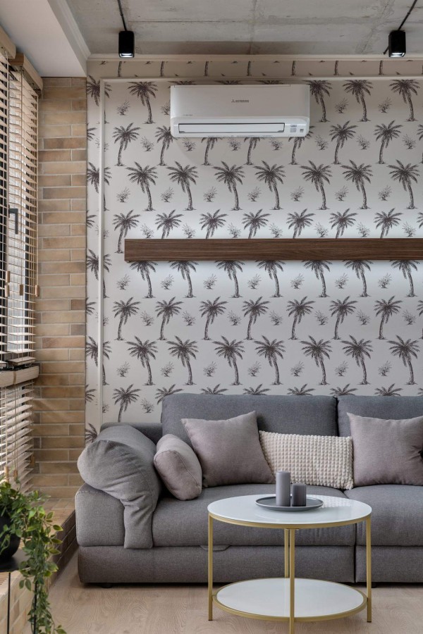 Scandinavian style living room decorated with Palm toile peel and stick wallpaper