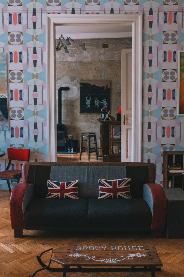 Industrial rustic style living dining room decorated with Pastel abstract shapes peel and stick wallpaper