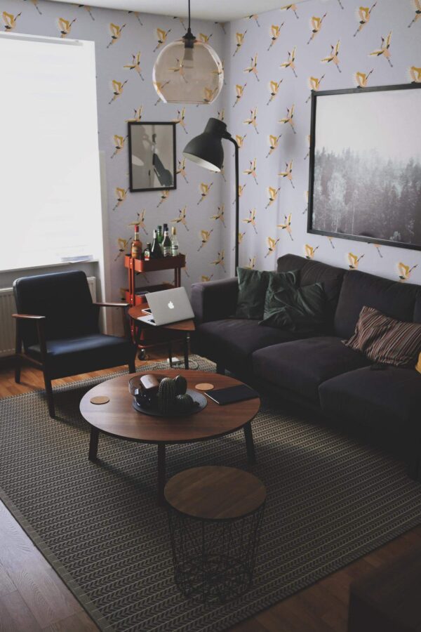 Modern dark industrial style living room decorated with Pastel Japanese crane peel and stick wallpaper