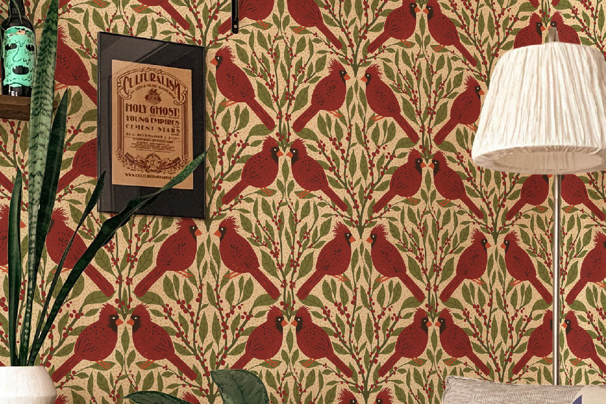 Living room with vintage-style wall art and bold red cardinal wallpaper featuring green leaves and berries – self-adhesive or non-woven wallpaper.