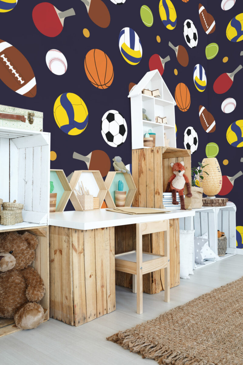 Colorful Sports Balls Pattern Wall Mural with basketballs, footballs, and tennis balls on a navy background, ideal for kids’ rooms and play areas.