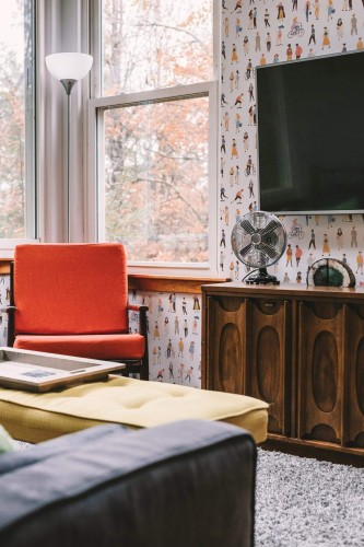Rustic style living room decorated with People in the city peel and stick wallpaper