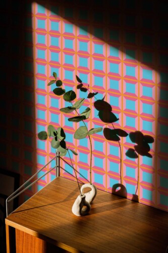 Mid-century style living room decorated with Pink and blue geometry peel and stick wallpaper
