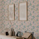 Scandinavian style bedroom decorated with Pink and green leaf pattern peel and stick wallpaper