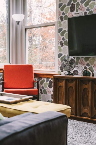 Rustic style living room decorated with Pink and green terrazzo peel and stick wallpaper
