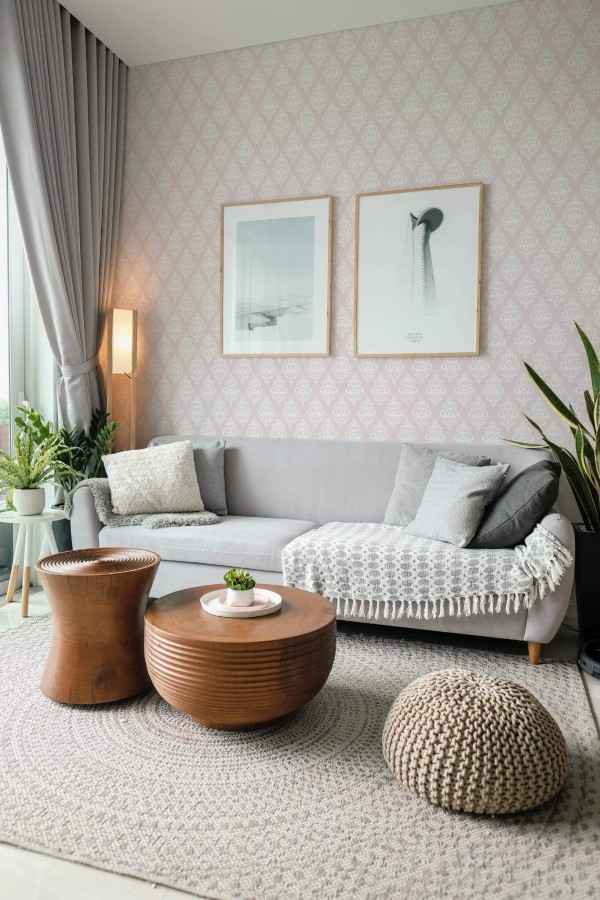 Modern scandinavian style living room decorated with Pink damask peel and stick wallpaper and green plants