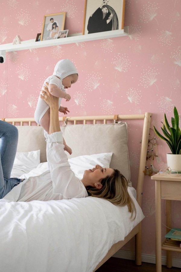 Neutral style nursery decorated with Pink nursery dandelion peel and stick wallpaper