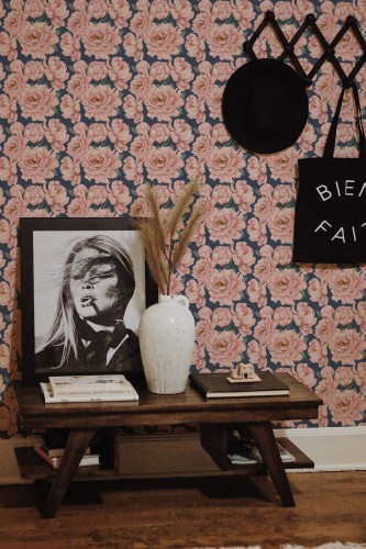 Rustic farmhouse style entryway decorated with Pink peony peel and stick wallpaper