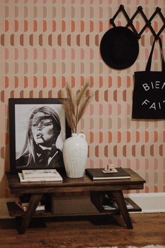 Rustic farmhouse style entryway decorated with Pink retro peel and stick wallpaper