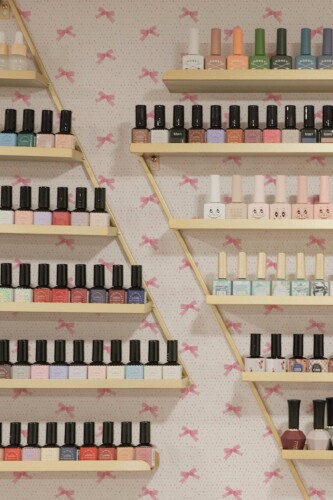 Fancy Walls peel and stick wallpaper with cute pink ribbon design