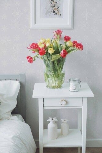 Farmhouse style bedroom decorated with Pink snowflake peel and stick wallpaper