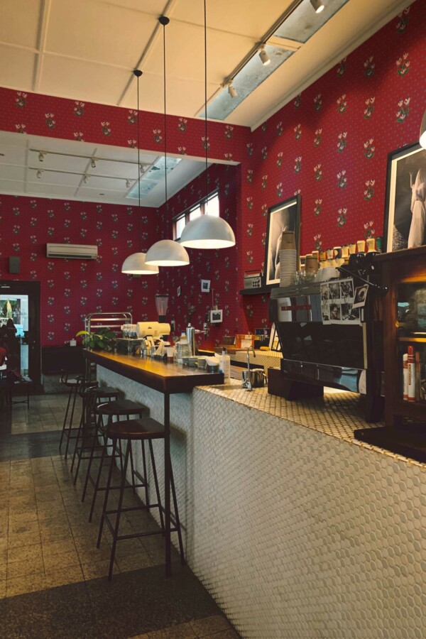 Pixel Bloom unpasted wallpaper in Burgundy by Fancy Walls