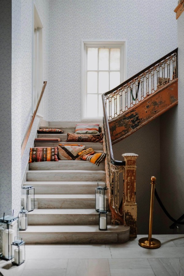 Victorian style hallway decorated with Polygon peel and stick wallpaper