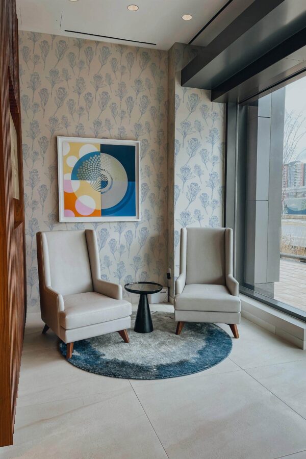 Mid-century-modern style living room decorated with Protea flower peel and stick wallpaper