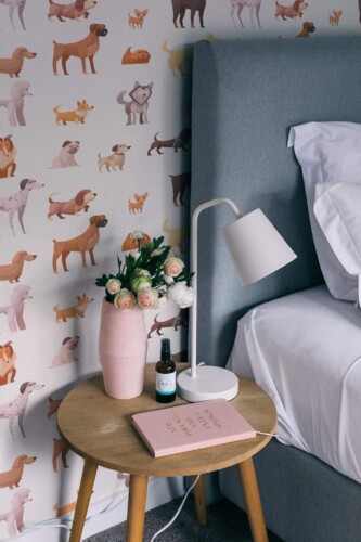 Rustic style bedroom decorated with Puppy breed peel and stick wallpaper
