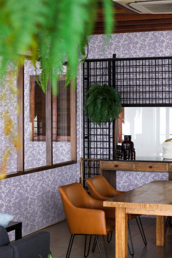 Mid-century modern style dining room decorated with Purple sakura peel and stick wallpaper and black industrial accents
