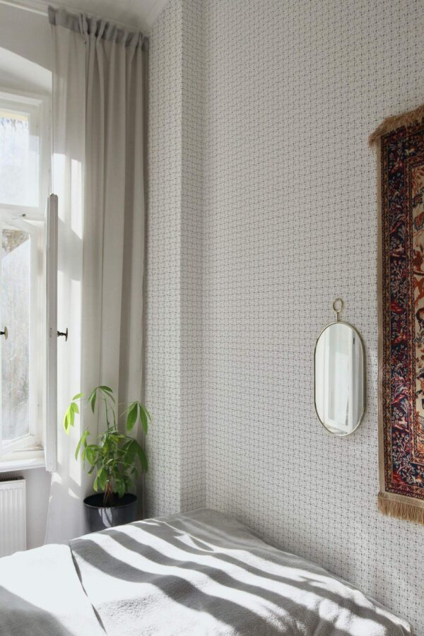 Bohemian style bedroom decorated with Puzzle peel and stick wallpaper