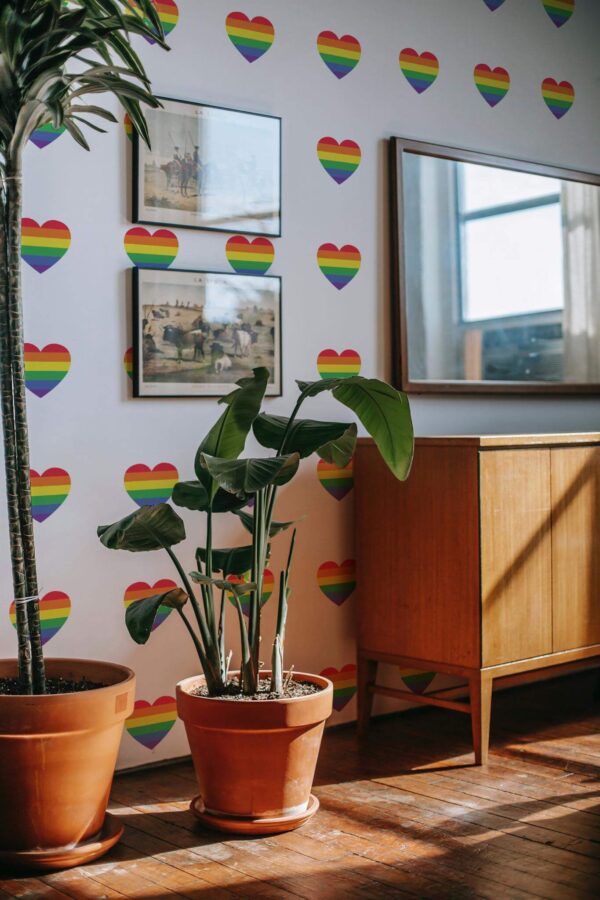 Mid-century modern style living room decorated with Rainbow hearts peel and stick wallpaper