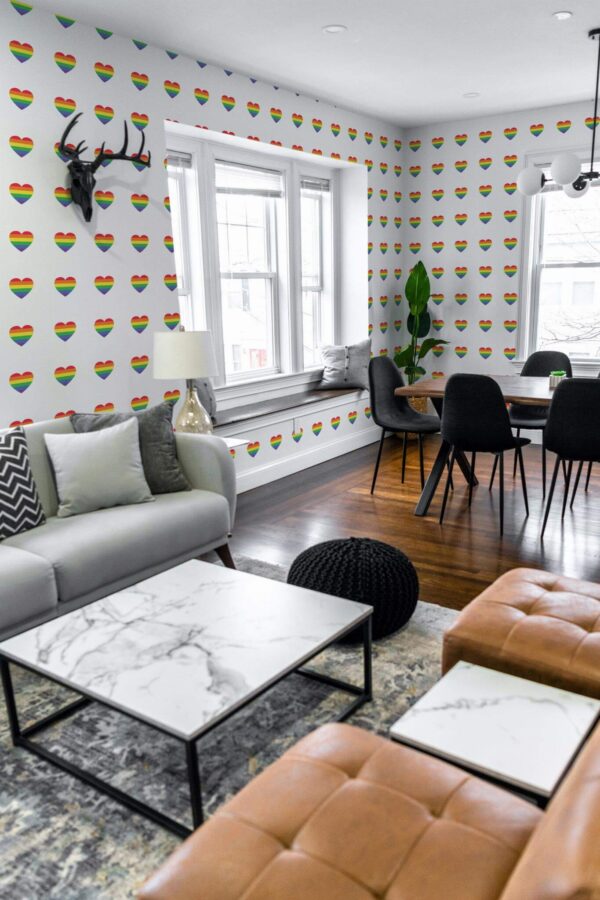 Mid-century modern scandinavian style living dining room decorated with Rainbow hearts peel and stick wallpaper