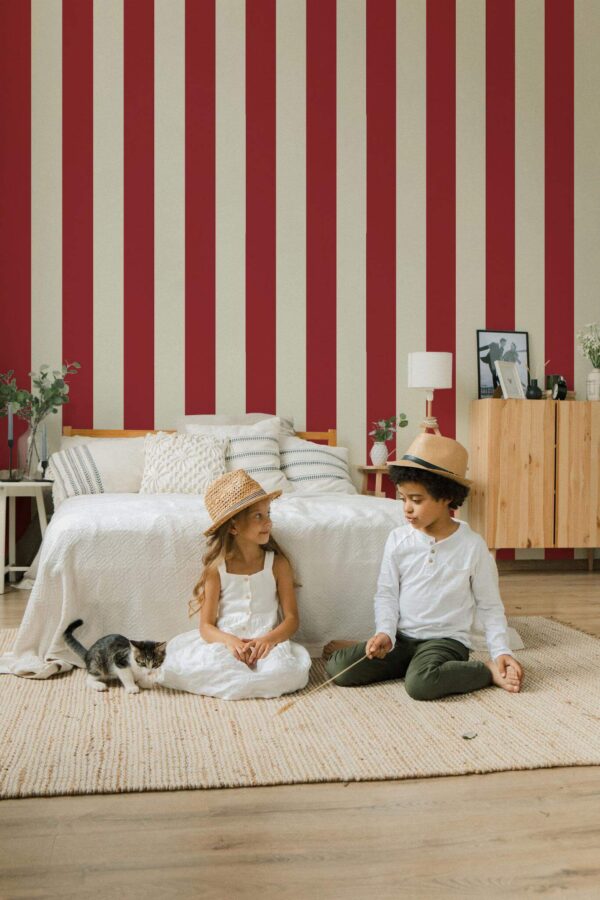 Scandinavian style bedroom decorated with Red cream stripes peel and stick wallpaper