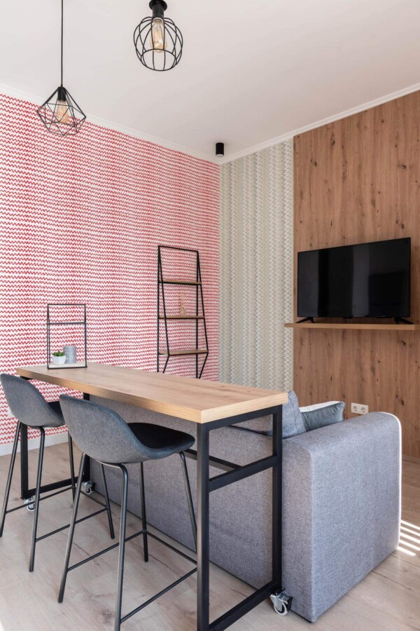 Scandinavian style open living room decorated with Red modern chevron peel and stick wallpaper