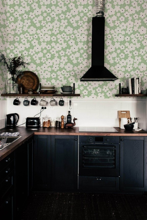 Dark industrial style kitchen decorated with Retro green floral peel and stick wallpaper