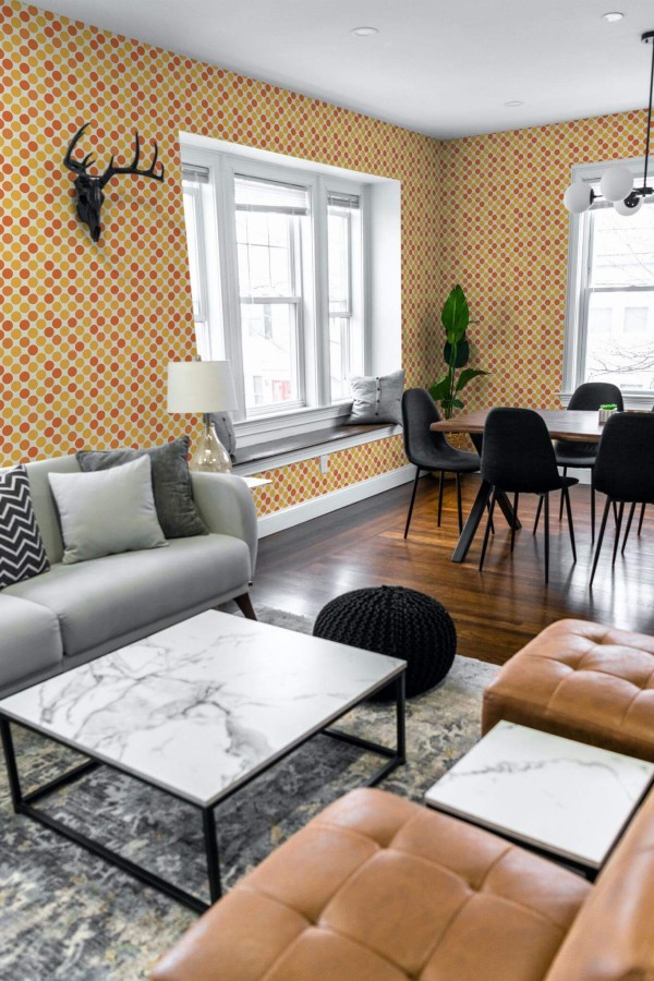 Mid-century modern scandinavian style living dining room decorated with Retro Polka dot peel and stick wallpaper