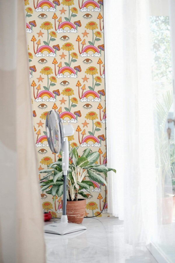 Retro Psychedelic Wallpaper featuring playful mushroom and floral motifs in warm oranges, yellows, and pinks on a soft pastel background, styled in a bright interior with sheer curtains, marble flooring, a modern standing fan, and a potted plant. The bold, vintage-inspired pattern adds a lively, bohemian accent to the room.