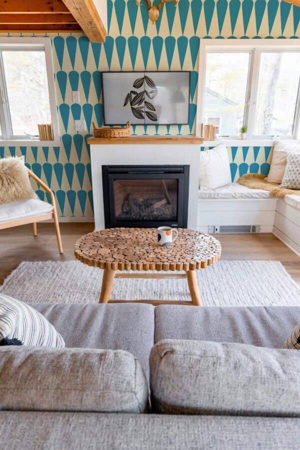 Farmhouse boho style living room decorated with Retro textile inspired peel and stick wallpaper