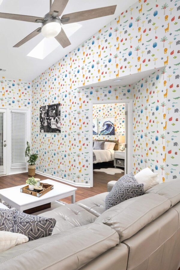 Coastal scandinavian style living room and bedroom decorated with Safari animals peel and stick wallpaper