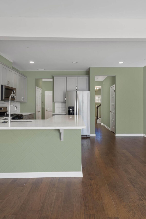 Minimal scandinavian style kitchen decorated with Sage green tile peel and stick wallpaper