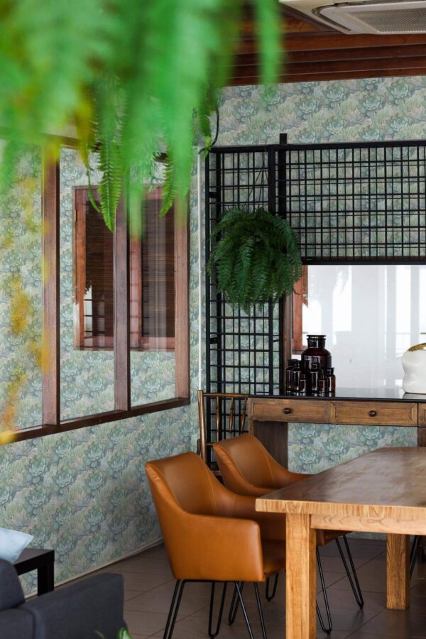Mid-century modern style dining room decorated with Sage succulent peel and stick wallpaper and black industrial accents