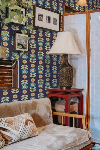 Southwestern style living room decorated with Scandinavian floral peel and stick wallpaper