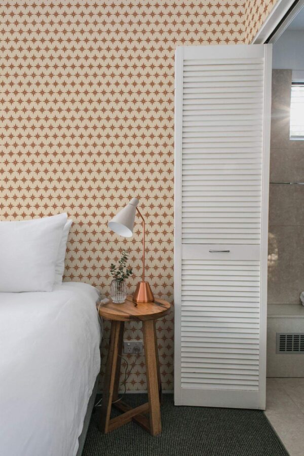 Minimalist style bedroom decorated with Scandinavian star peel and stick wallpaper