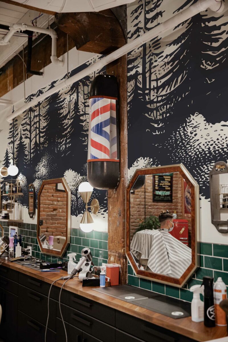 Barbershop Forest Classic wall mural with black and white tree forest silhouette design, perfect for barber shops, accent walls, or moody interiors.