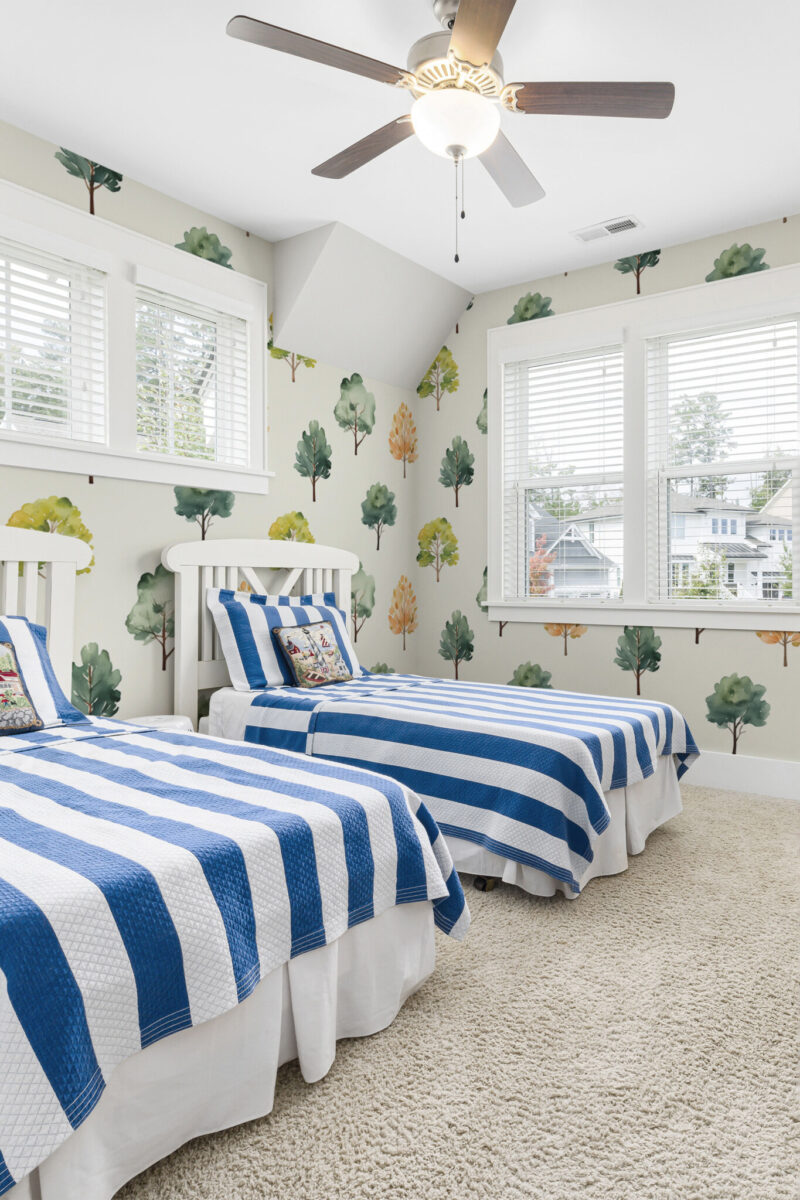 Serene Watercolor Tree wall mural with green and white watercolor forest design, perfect for kids' rooms or playful reading nooks.