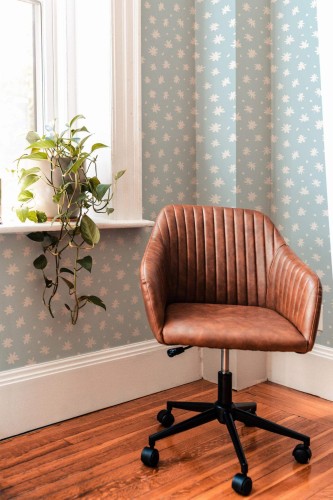 Mid-century modern style living room decorated with Simple daisy floral peel and stick wallpaper